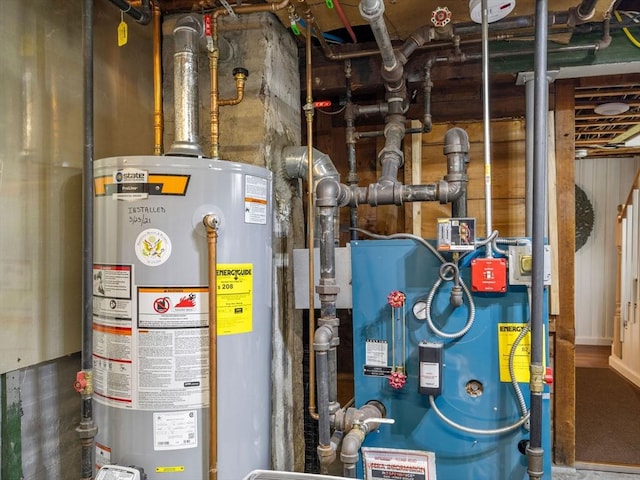 utility room featuring gas water heater