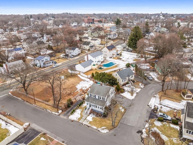 birds eye view of property with a residential view