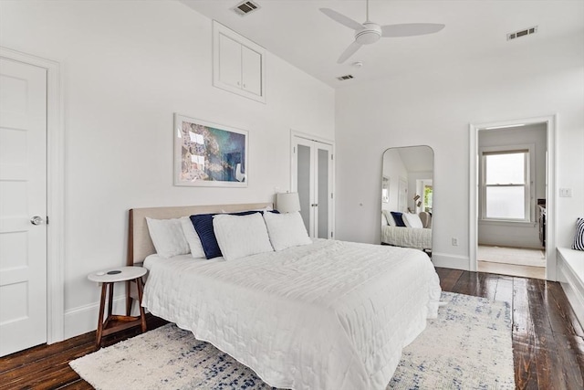 17 Atlantic St, Boston, MA 02127 - bedroom with dark wood-type flooring, baseboards, arched walkways, ceiling fan, and a closet