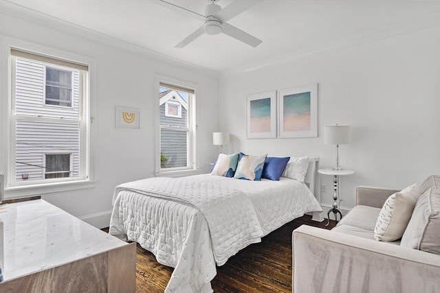 17 Atlantic St, Boston, MA 02127 - bedroom with baseboards, dark wood-style floors, ornamental molding, and ceiling fan
