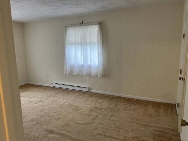 188 Swanson Rd Unit 331, Boxborough, MA 01719 - empty room with a baseboard heating unit, carpet flooring, baseboards, and a textured ceiling