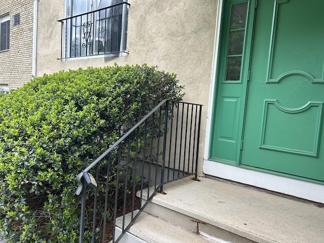 188 Swanson Rd Unit 331, Boxborough, MA 01719 - view of exterior entry with stucco siding