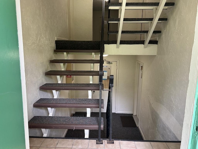 188 Swanson Rd Unit 331, Boxborough, MA 01719 - staircase featuring a textured wall