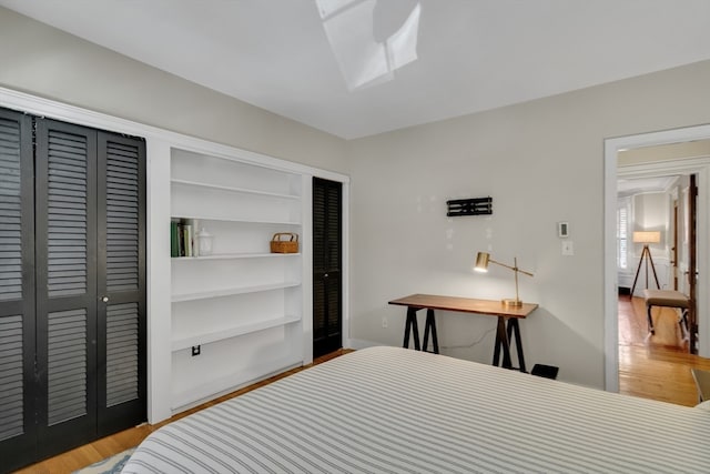 bedroom featuring hardwood / wood-style floors