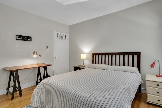 bedroom featuring hardwood / wood-style floors