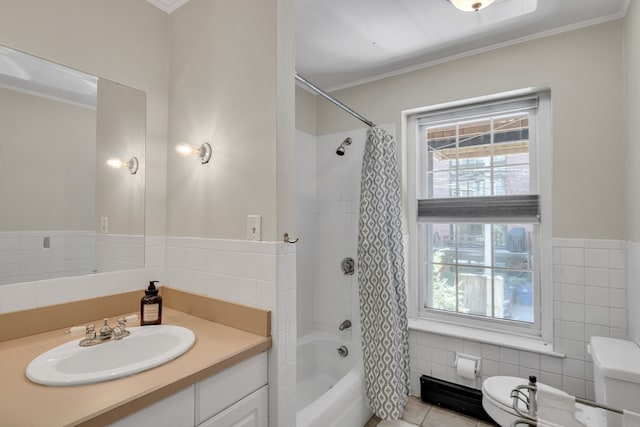 full bathroom with toilet, ornamental molding, vanity, tile walls, and shower / bath combination with curtain