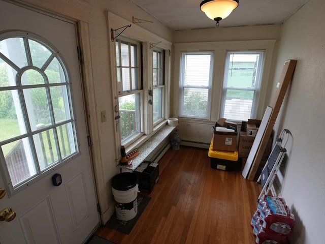 95AKA93 Lynnway, Revere, MA 02151 - doorway featuring wood finished floors, plenty of natural light, and a baseboard radiator