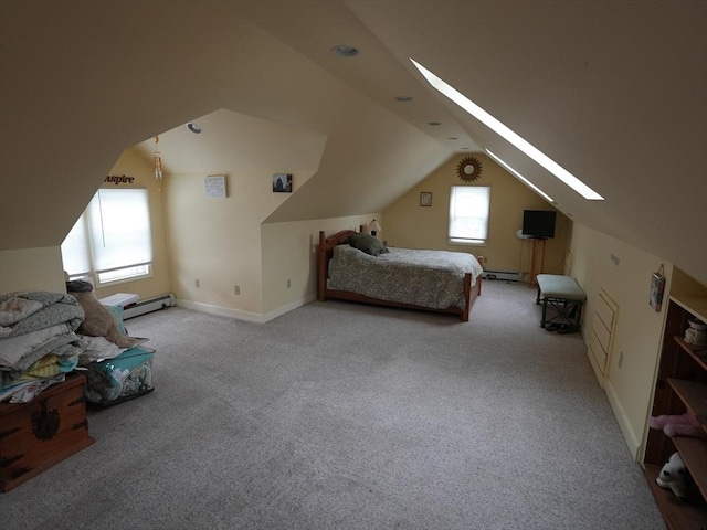 95AKA93 Lynnway, Revere, MA 02151 - carpeted bedroom with a skylight, vaulted ceiling, baseboard heating, and baseboards