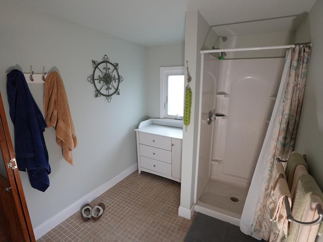 95AKA93 Lynnway, Revere, MA 02151 - bathroom featuring a shower stall and baseboards