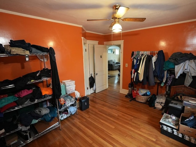 95AKA93 Lynnway, Revere, MA 02151 - bedroom with wood finished floors, ornamental molding, and ceiling fan