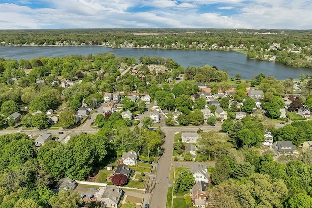 aerial overview of property's location featuring a large body of water and nearby suburban area