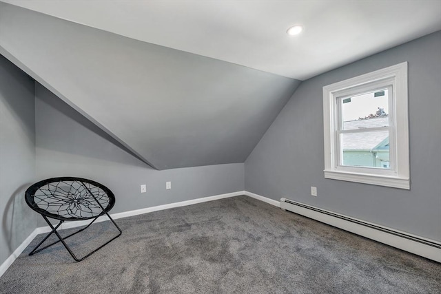 additional living space with baseboard heating, vaulted ceiling, baseboards, carpet floors, and recessed lighting