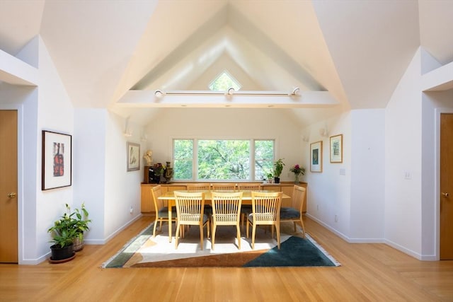 51 Naples, Brookline, MA 02446 - dining area with healthy amount of natural light, lofted ceiling, and light wood finished floors