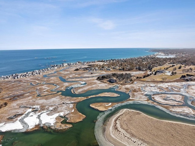 birds eye view of property featuring a view of the beach and a water view