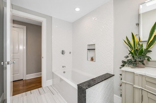 bathroom with vanity and wood-type flooring