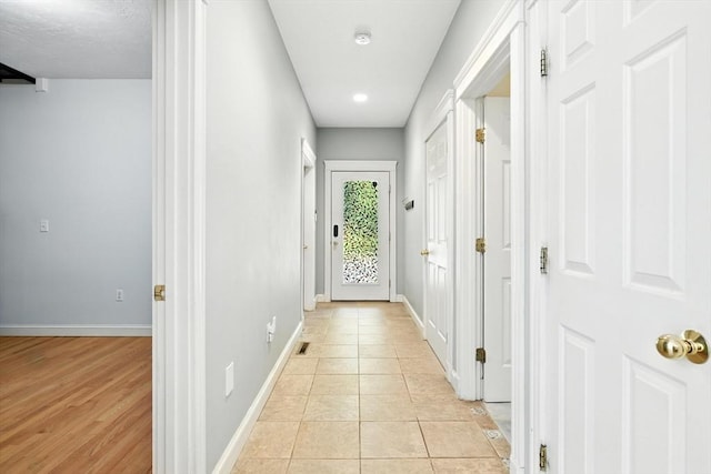 19 Hawthorn Rd, Amherst, MA 01002 - entryway with light tile patterned floors and recessed lighting