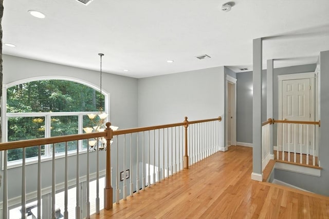 19 Hawthorn Rd, Amherst, MA 01002 - corridor with light wood-style flooring, recessed lighting, and an upstairs landing