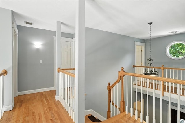 19 Hawthorn Rd, Amherst, MA 01002 - hallway featuring an upstairs landing and wood finished floors