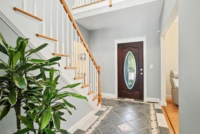 19 Hawthorn Rd, Amherst, MA 01002 - entrance foyer with inlaid floor details and stairway