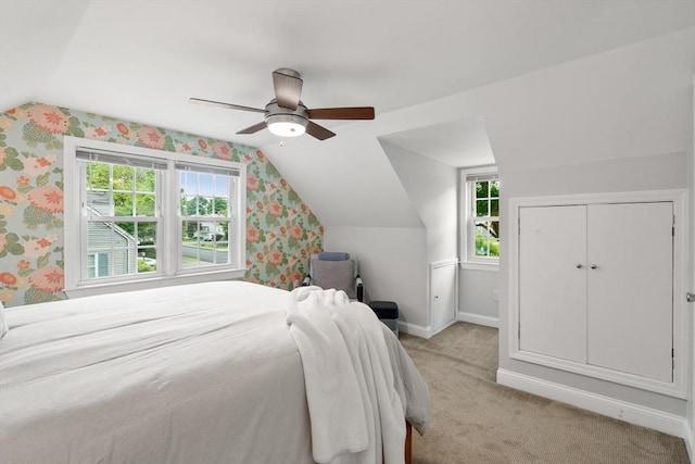99 Edgehill Rd, Norwood, MA 02062 - bedroom featuring lofted ceiling, multiple windows, light carpet, a ceiling fan, and wallpapered walls