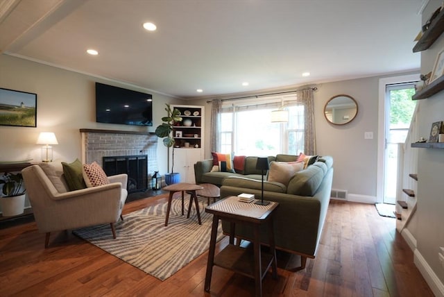 99 Edgehill Rd, Norwood, MA 02062 - living area featuring a brick fireplace, hardwood / wood-style flooring, recessed lighting, and ornamental molding