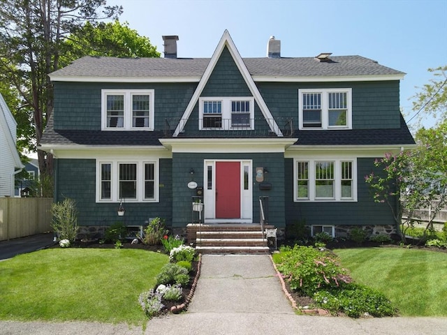 14 Merrill Rd Unit 0, Marblehead, MA 01945 - view of front of house with a chimney and a shingled roof