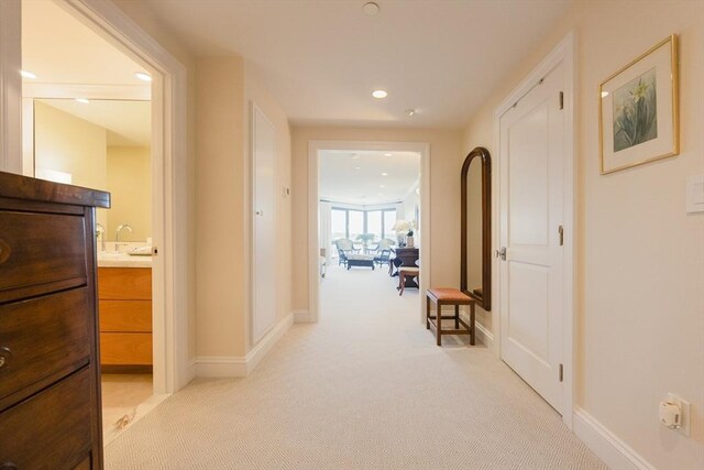 2001 Marina Dr Unit 707, Quincy, MA 02171 - hall with light carpet, recessed lighting, and baseboards
