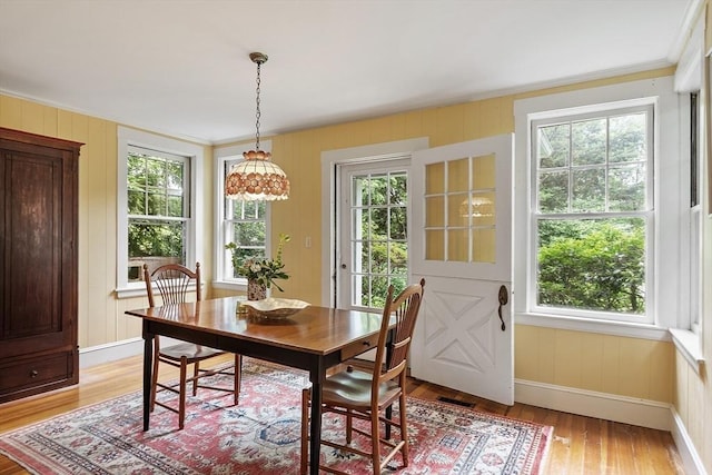 14 Upland Rd, Andover, MA 01810 - dining area featuring healthy amount of natural light, crown molding, and light wood-style flooring
