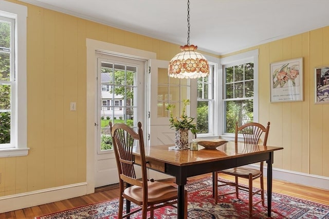 14 Upland Rd, Andover, MA 01810 - dining space featuring crown molding, light wood-style floors, and healthy amount of natural light