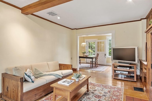 14 Upland Rd, Andover, MA 01810 - living room featuring light wood finished floors, crown molding, and wainscoting