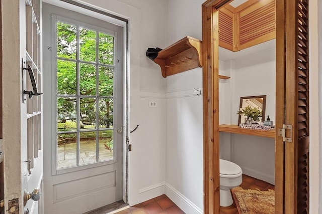14 Upland Rd, Andover, MA 01810 - doorway to outside featuring baseboards