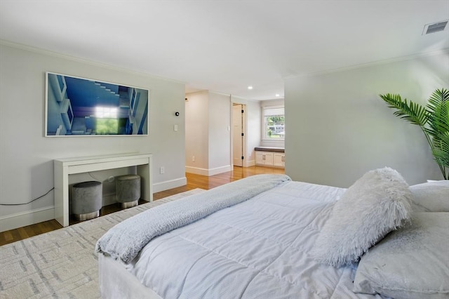 290 Lyman Rd, Milton, MA 02186 - bedroom with crown molding, wood finished floors, baseboards, and recessed lighting