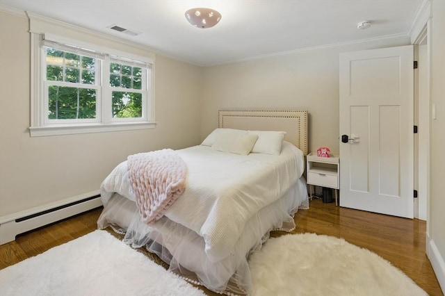 290 Lyman Rd, Milton, MA 02186 - bedroom featuring ornamental molding, wood finished floors, and a baseboard radiator