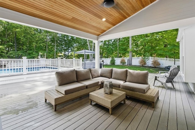 290 Lyman Rd, Milton, MA 02186 - wooden terrace featuring a fenced backyard, an outdoor hangout area, and a swimming pool