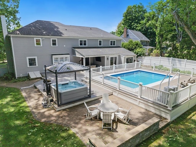 290 Lyman Rd, Milton, MA 02186 - view of pool with a hot tub, a deck, and a patio