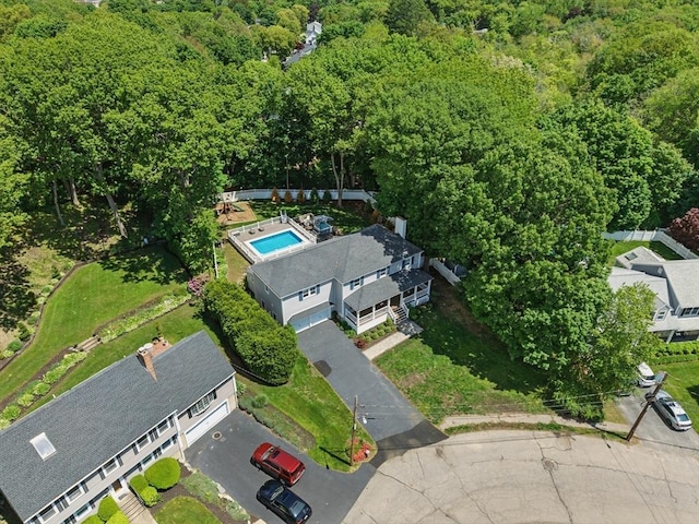 290 Lyman Rd, Milton, MA 02186 - drone / aerial view of a pool and a heavily wooded area