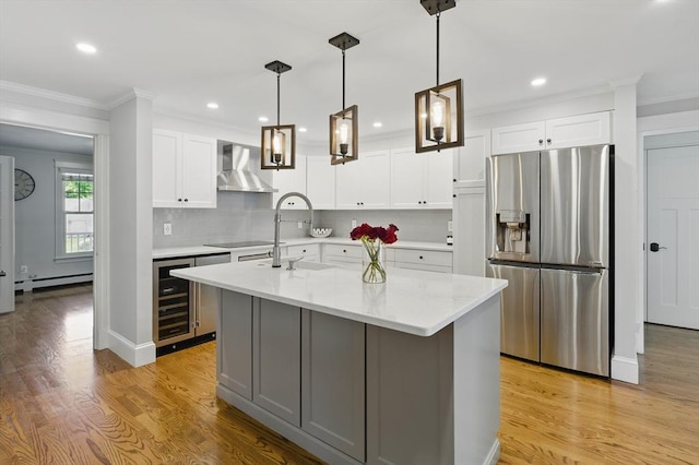 290 Lyman Rd, Milton, MA 02186 - kitchen with stainless steel fridge with ice dispenser, wall chimney exhaust hood, crown molding, wine cooler, and light wood-style floors
