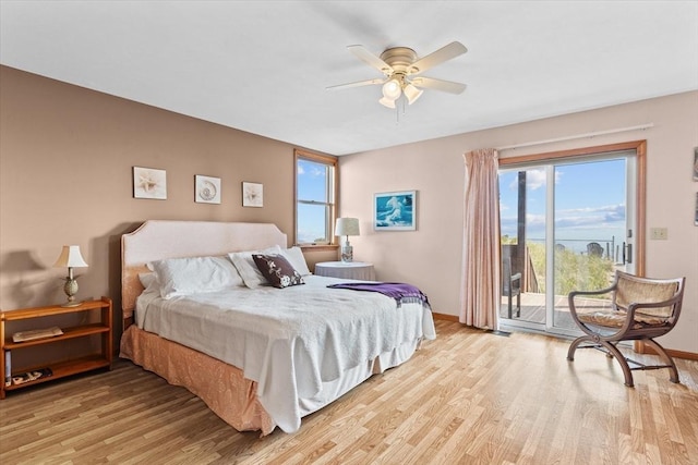 492 N End Blvd, Salisbury, MA 01952 - bedroom featuring access to exterior, light wood-style flooring, and ceiling fan
