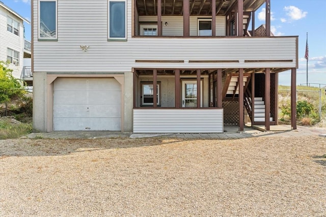 492 N End Blvd, Salisbury, MA 01952 - view of front of property featuring a garage and stairs