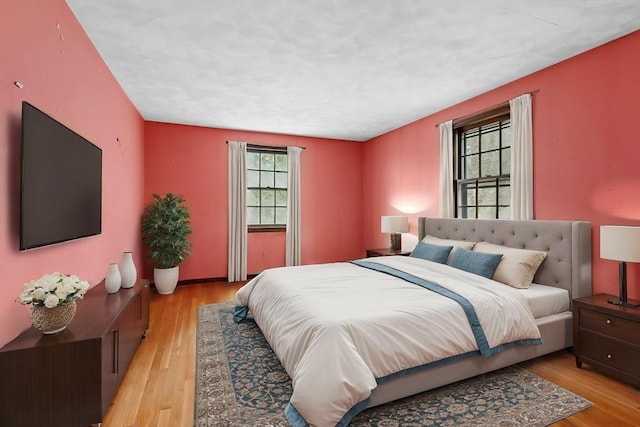 bedroom with light wood-style flooring