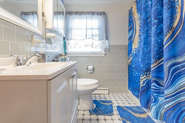 101 Primrose St, Fall River, MA 02720 - bathroom featuring tile walls, vanity, tile patterned floors, a shower with shower curtain, and wainscoting