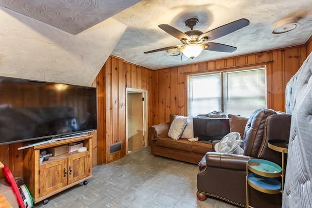 101 Primrose St, Fall River, MA 02720 - living room with wooden walls and ceiling fan