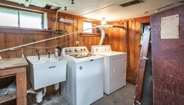 101 Primrose St, Fall River, MA 02720 - laundry room with wooden walls and separate washer and dryer