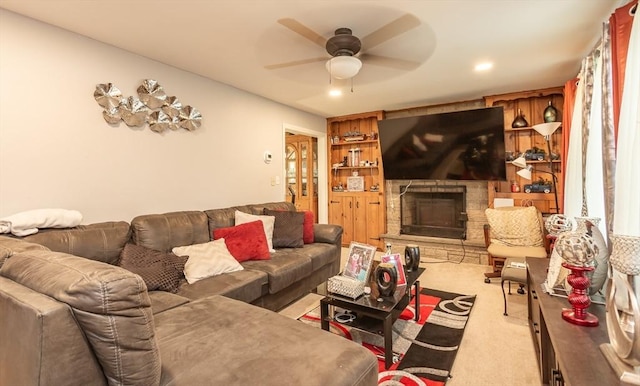 101 Primrose St, Fall River, MA 02720 - living area with carpet, ceiling fan, and a stone fireplace