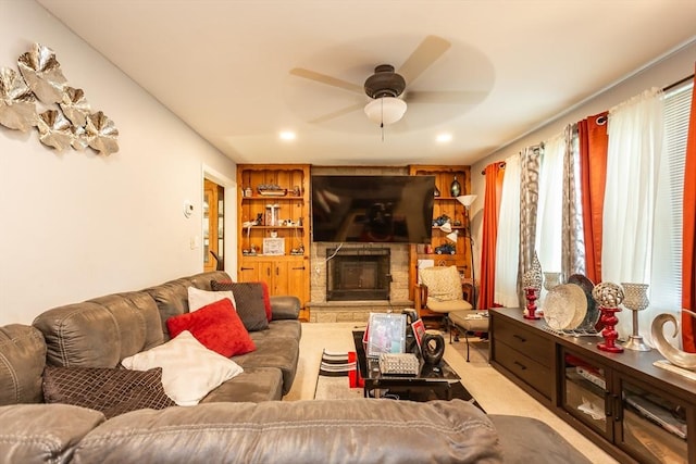 101 Primrose St, Fall River, MA 02720 - carpeted living room with ceiling fan and a stone fireplace
