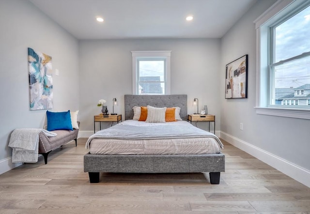 bedroom featuring light wood-type flooring