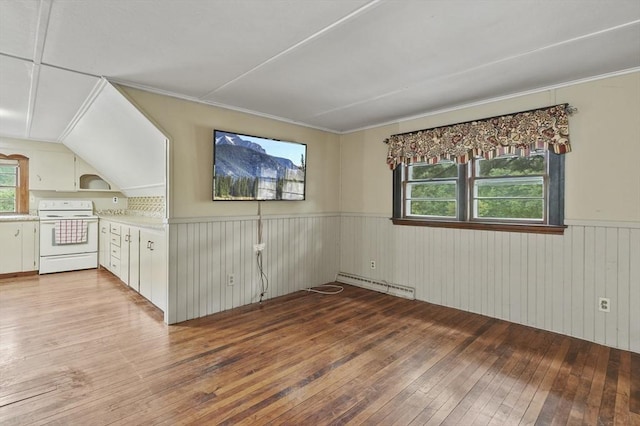 3 Cranberry Meadow Shore Rd, Charlton, MA 01507 - unfurnished room featuring a baseboard heating unit, light wood-type flooring, wainscoting, and wooden walls