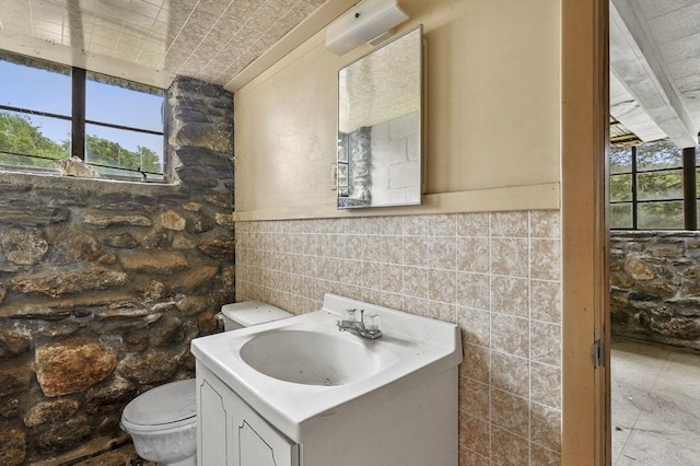 3 Cranberry Meadow Shore Rd, Charlton, MA 01507 - half bathroom featuring vanity and tile walls
