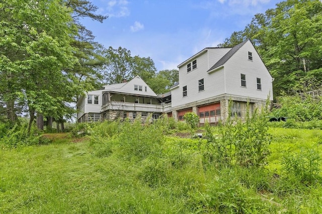 3 Cranberry Meadow Shore Rd, Charlton, MA 01507 - rear view of house with a garage