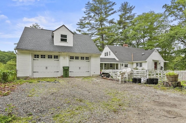 3 Cranberry Meadow Shore Rd, Charlton, MA 01507 - rear view of house with a garage and an outdoor structure